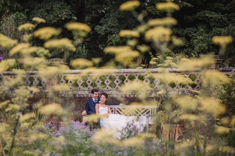 Bride and Groom in grounds of Wiston House 
